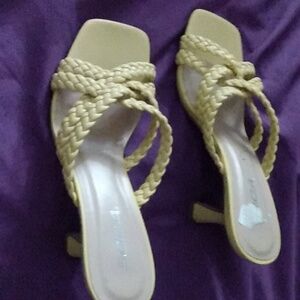 Yellow three and a half inch sandal, barely used. Multi twist strap slip on